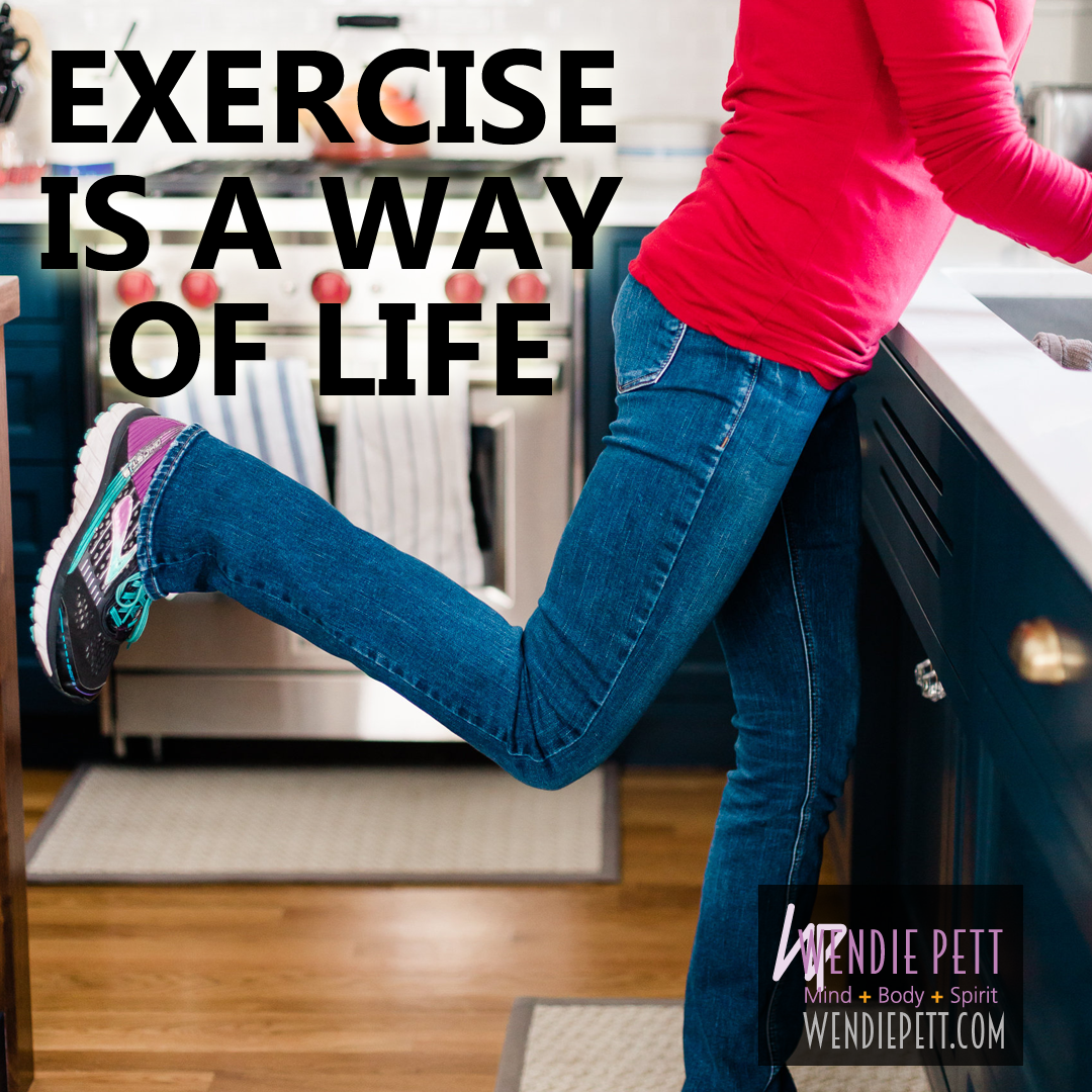 Exercises-Close up of Wendie Pett doing a hamstring curl at the kitchen sink next to text that says, "exercise is a way of life."